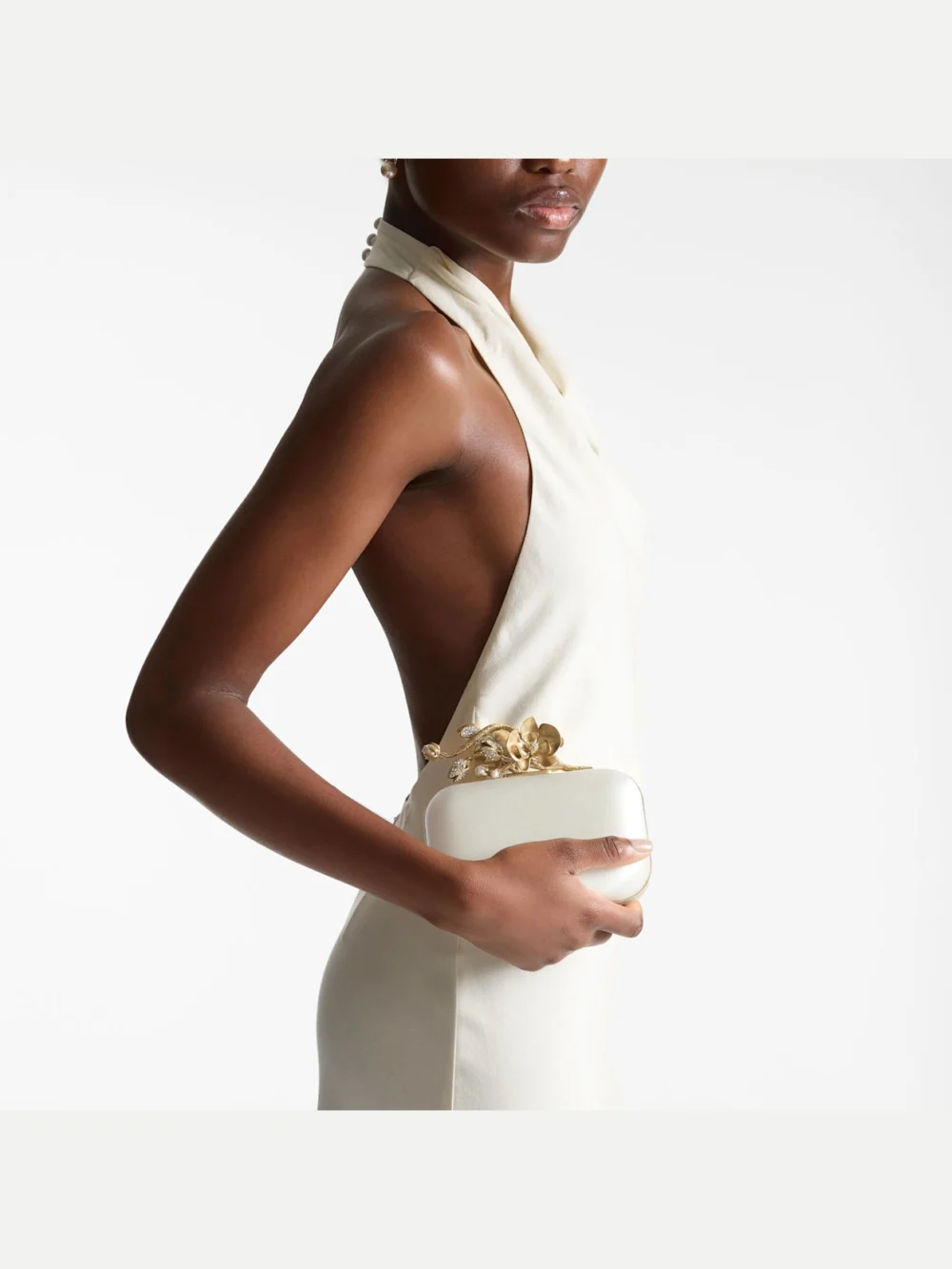 Side view of the Jimmy Choo Cloud Ivory Satin Clutch Bag