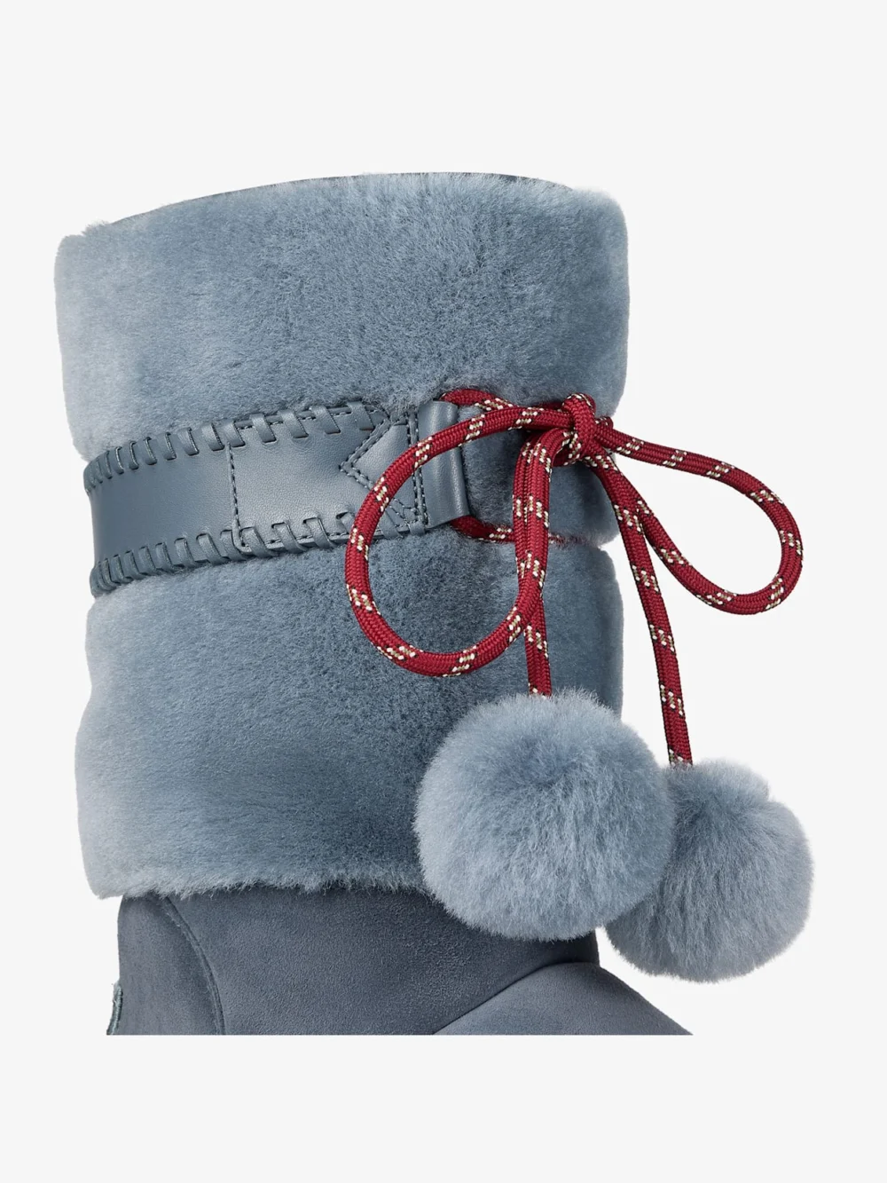 Close-up detail of the Jimmy Choo Cobi Arctic Blue Suede Mid Boots with Shearling Lining