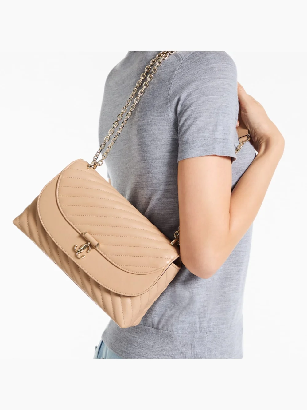 Side view of the Jimmy Choo Curve Cross Body Medium Chai Quilted Biker Leather Crossbody Bag