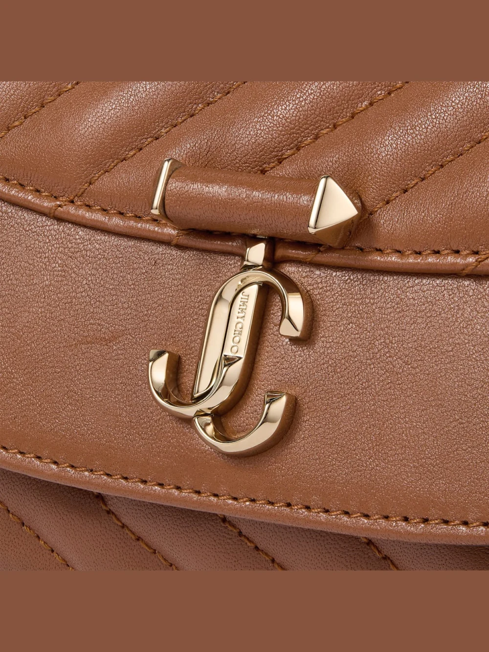 Back view of the Jimmy Choo Curve Crossbody Small Tan Quilted Biker Leather Crossbody Bag