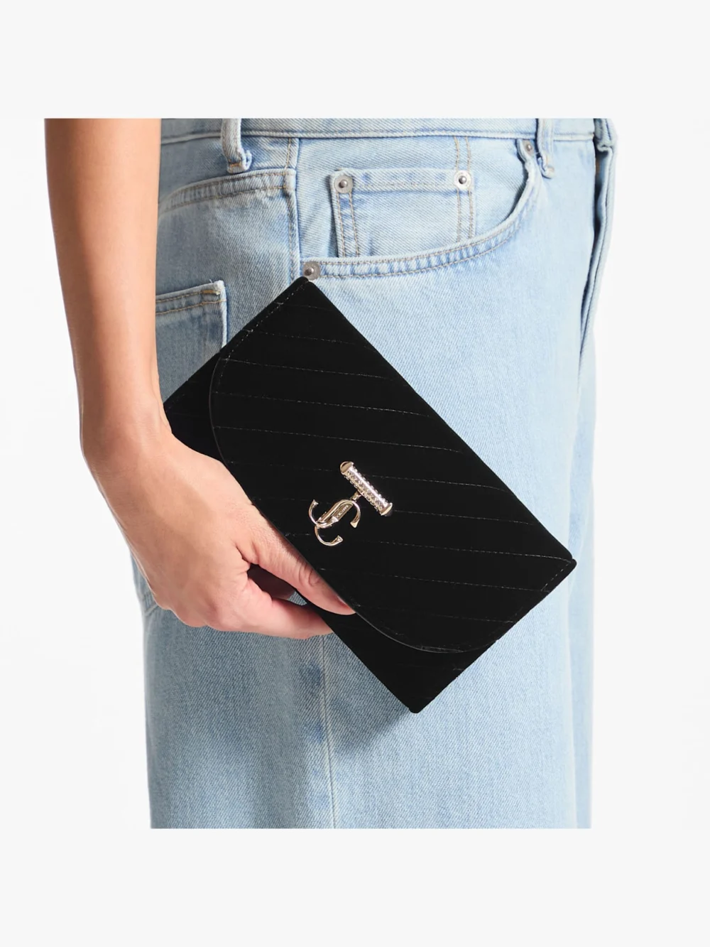 Side view of the Jimmy Choo Curve Wallet with Chain Black Quilted Velvet Mini Bag with Crystal Jc Bar