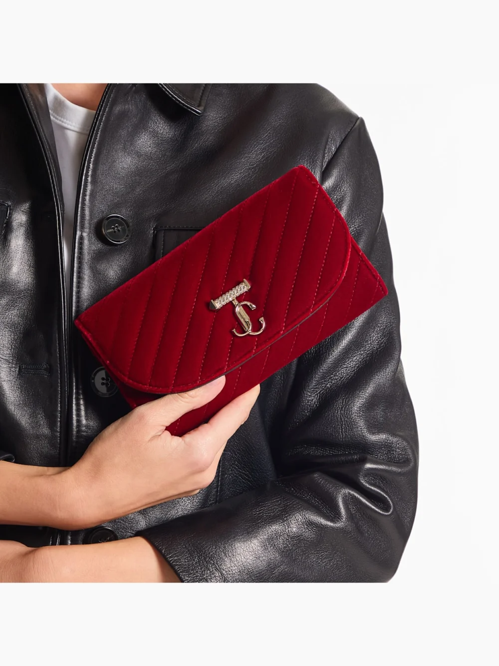 Side view of the Jimmy Choo Curve Wallet with Chain Ruby Red Quilted Velvet Clutch Bag with Crystal Jc Bar