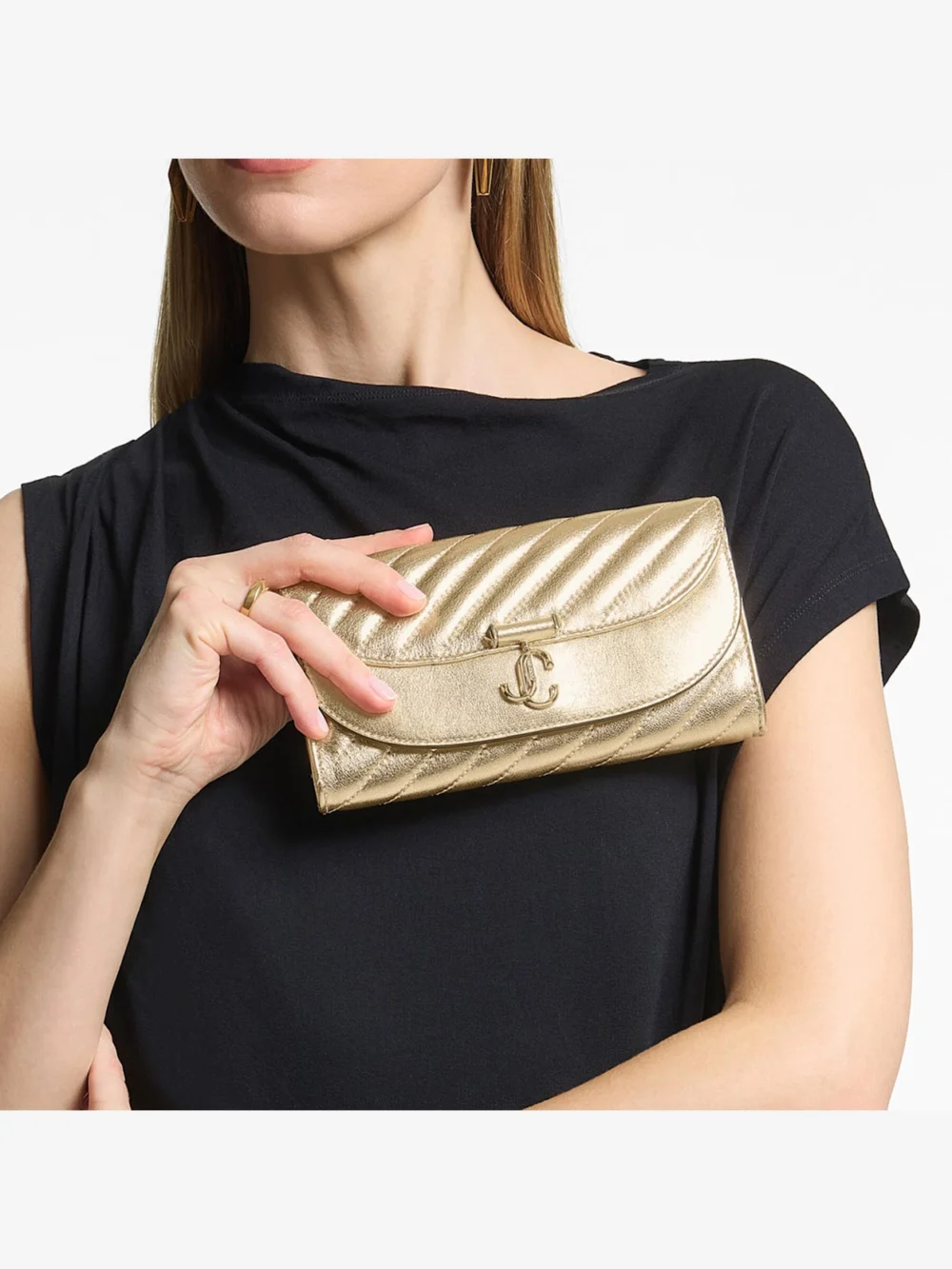 Side view of the Jimmy Choo Curve Wallet with Chain Shiny Gold Quilted Metallic Leather Clutch