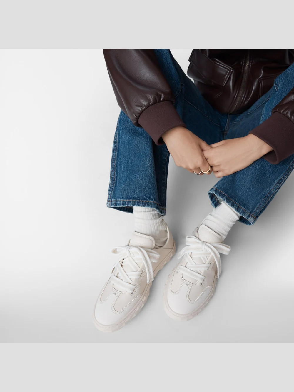 Side view of the Jimmy Choo Diamond Light Flex F Latte Leather Mix Trainers