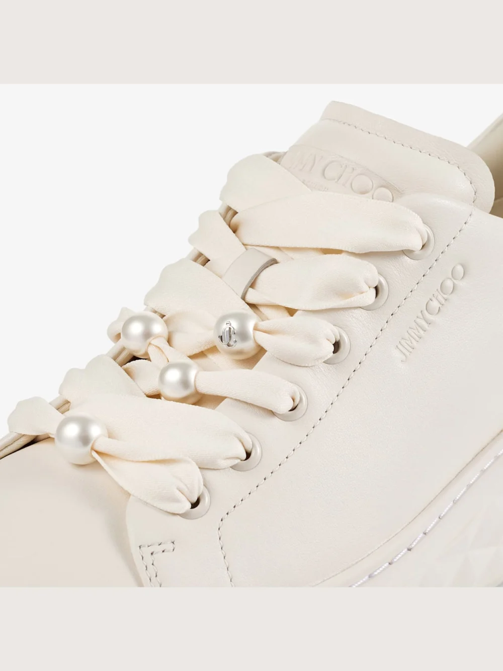 Close-up detail of the Jimmy Choo Diamond Light Maxi F Latte Smooth Leather and Coarse Glitter Trainers