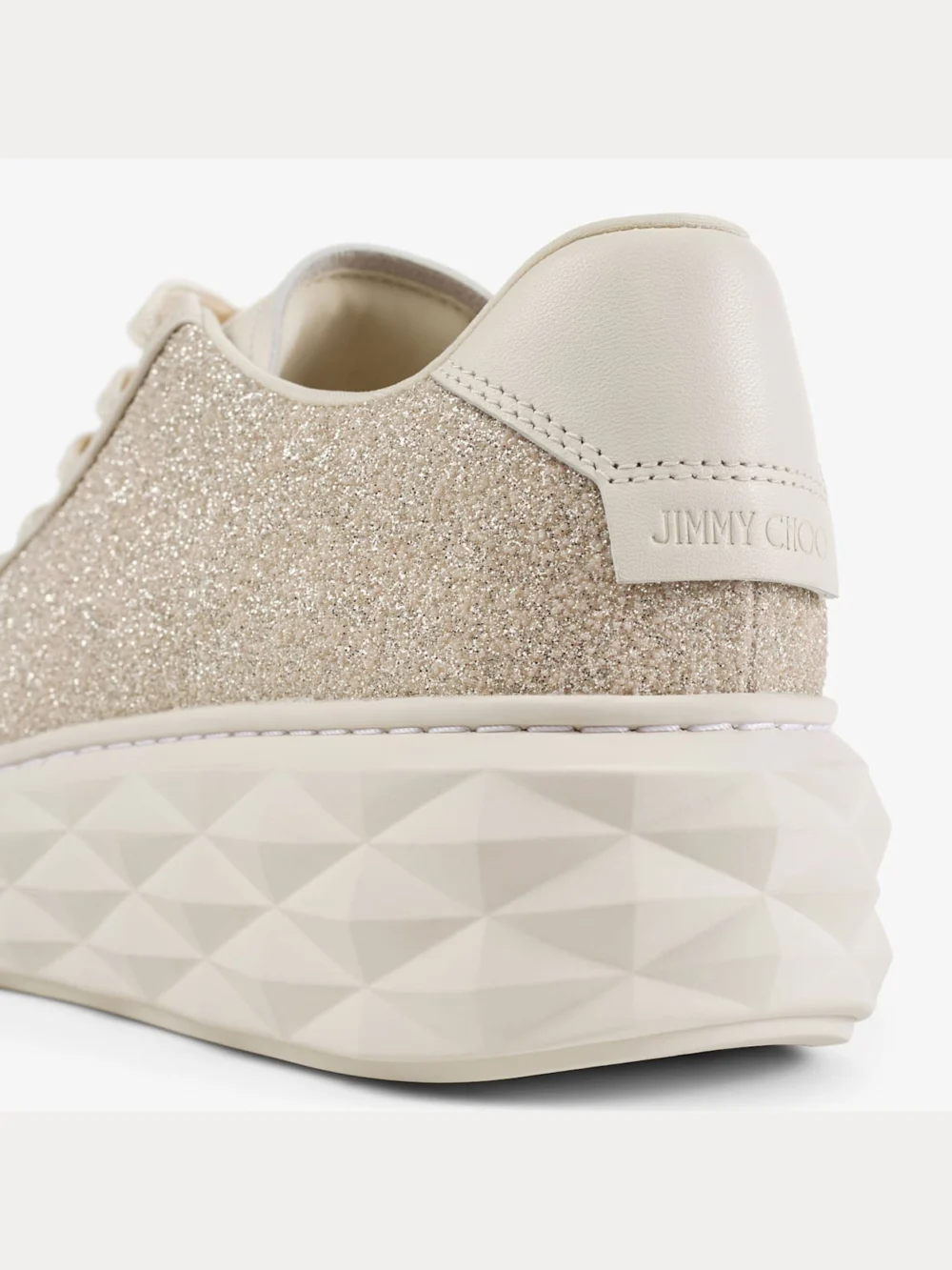 Close-up detail of the Jimmy Choo Diamond Light Maxi F Light Soft Gold Caviar Glitter and Leather Mix Trainers