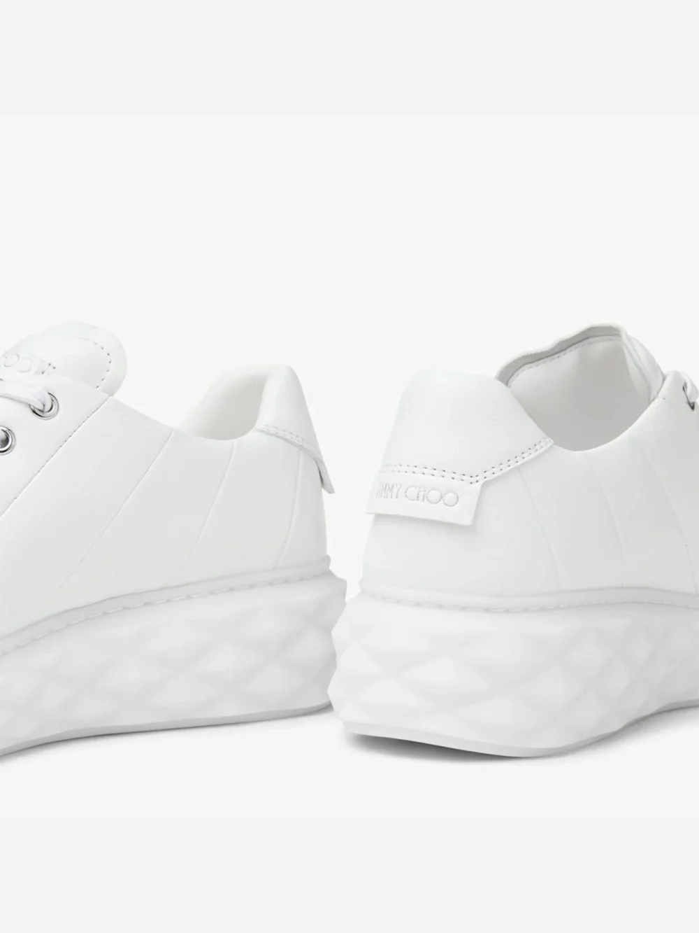 Close-up detail of the Jimmy Choo Diamond Light Maxi F White Nappa Leather Low Top Trainers with Platform Sole