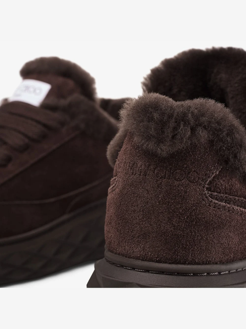 Close-up detail of the Jimmy Choo Diamond Maxi Retro F Chocolate Velvet Suede Low Top Trainers with Shearling