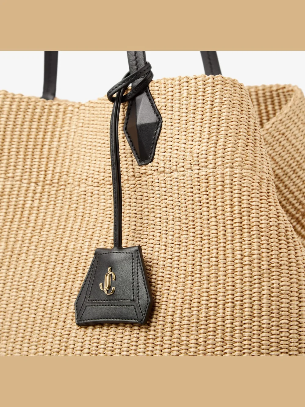 Close-up detail of the Jimmy Choo Diamond Tote Large Natutal Raffia Tote Bag
