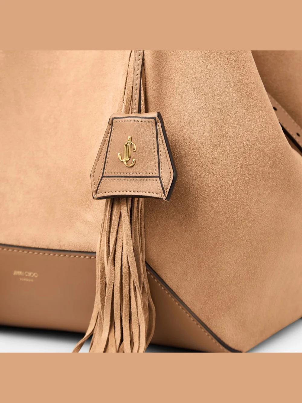 Back view of the Jimmy Choo Diamond Tote Medium Toffee Suede Tote Bag with Fringes
