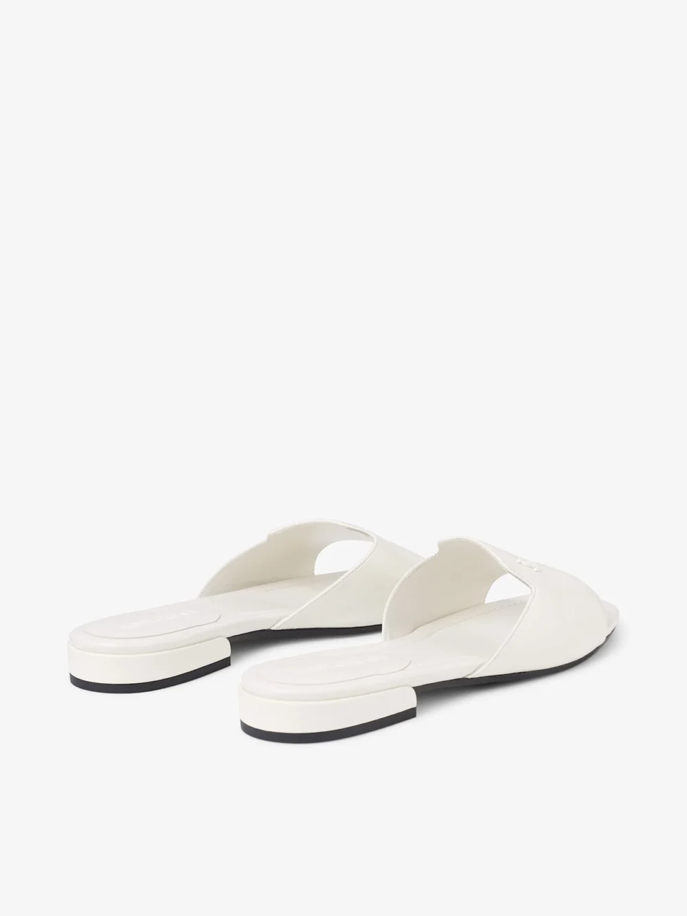 Close-up detail of the Jimmy Choo Dina Flat Latte Nappa Leather Flats