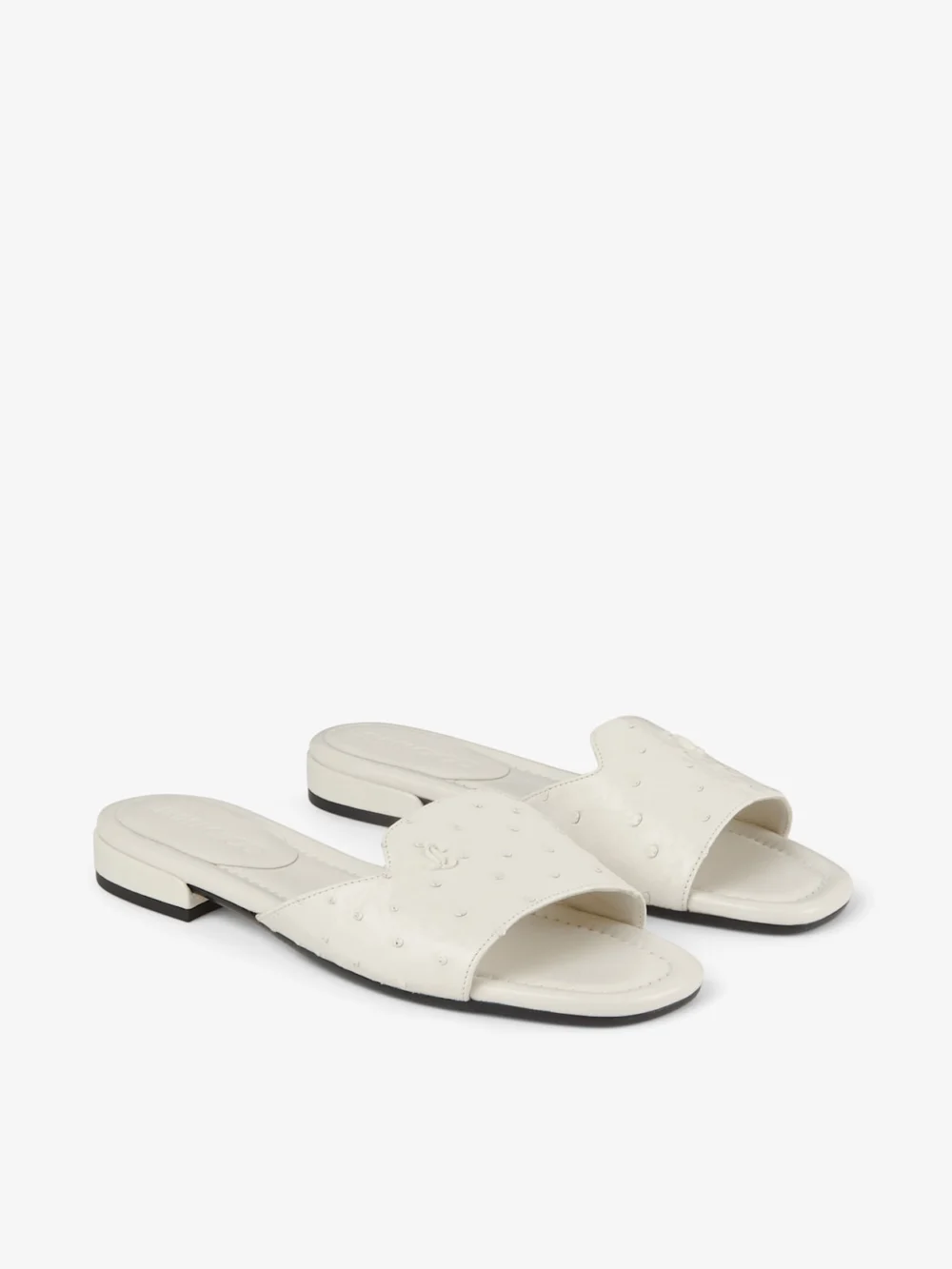 Close-up detail of the Jimmy Choo Dina Flat Latte Ostrich Leather Flats
