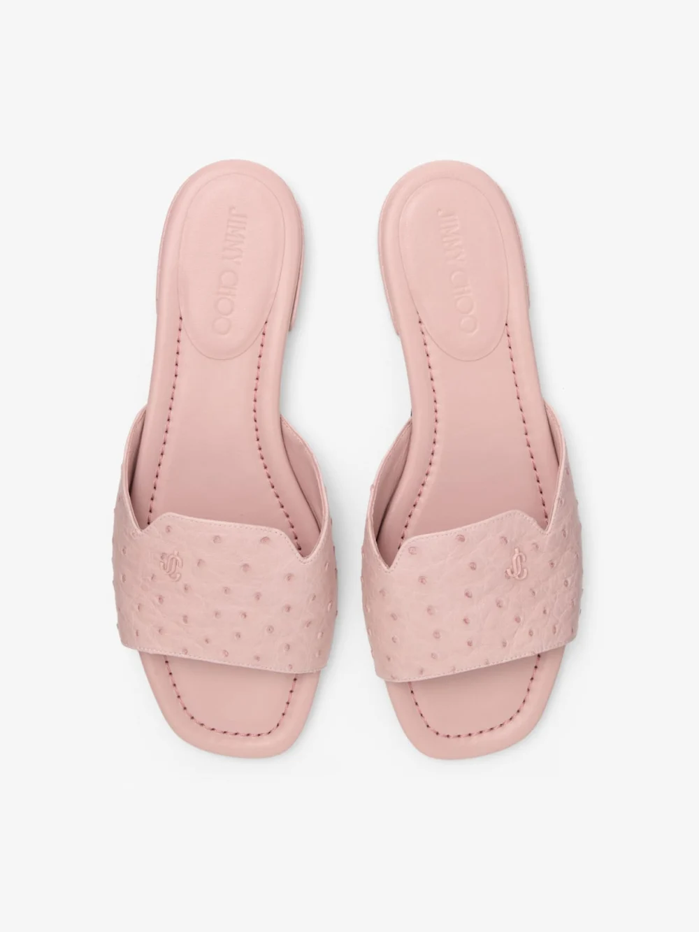 Close-up detail of the Jimmy Choo Dina Flat Rose Ostrich Leather Flats