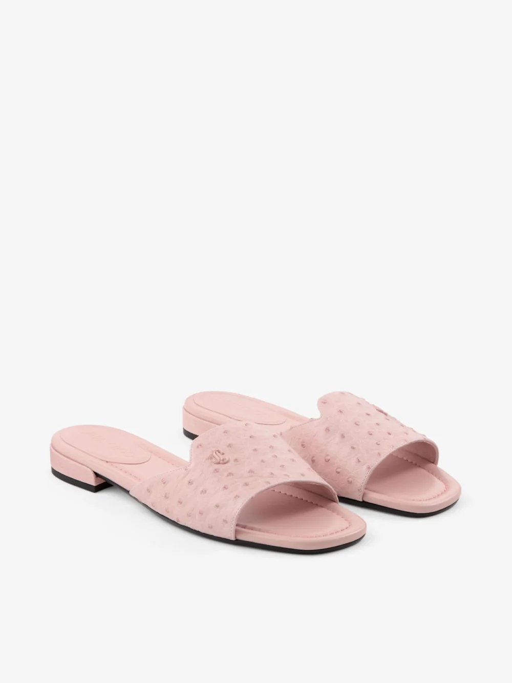 Side view of the Jimmy Choo Dina Flat Rose Ostrich Leather Flats