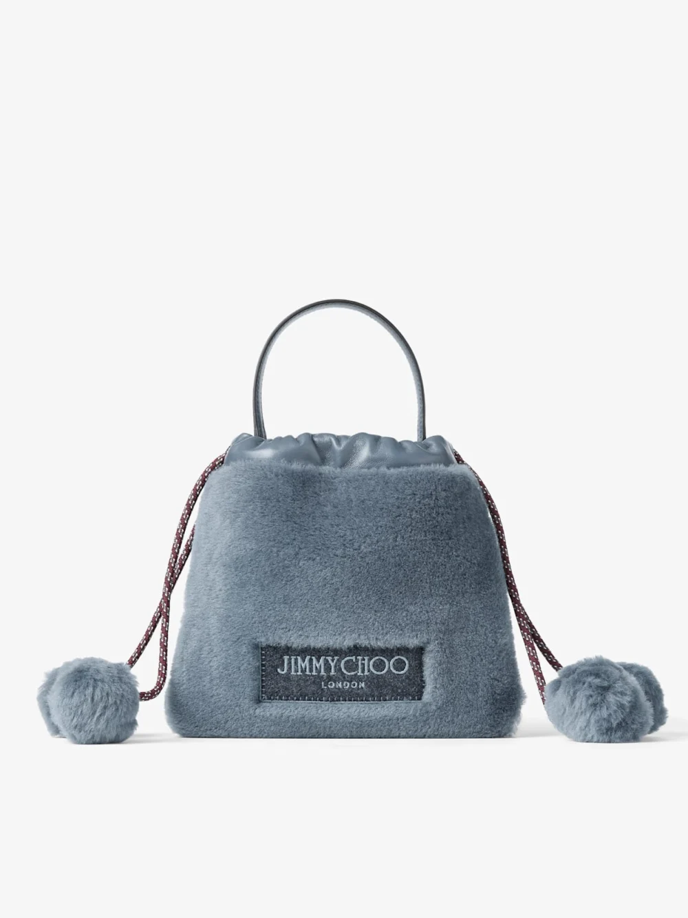 Jimmy Choo Drawstring Pouch Top Handle Arctic Blue Shearling and Nappa Leather Drawstring Pouch with Pom Poms in arctic blue
