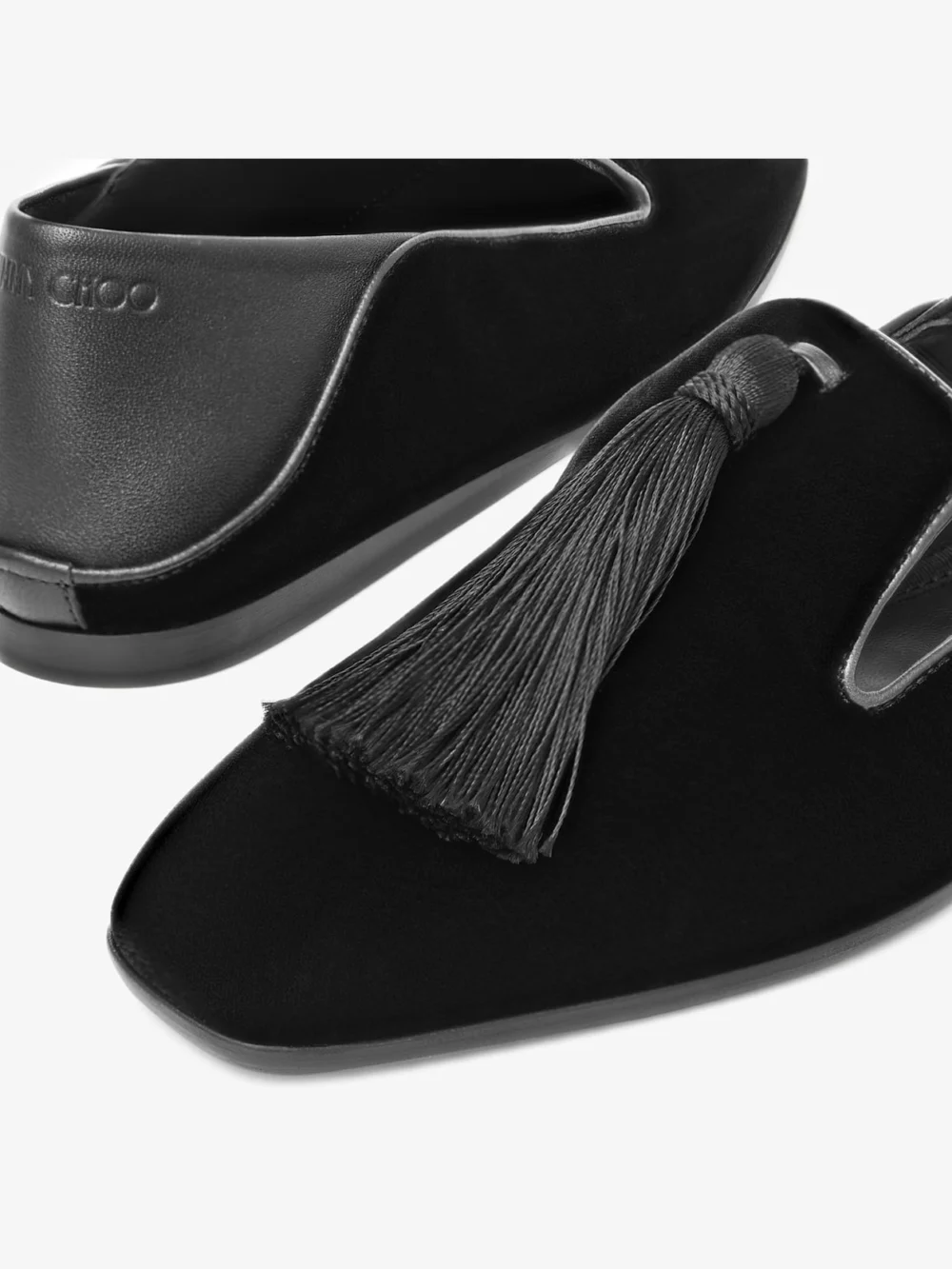 Close-up detail of the Jimmy Choo Eliot Slipper Black Velvet Slippers with Tassel