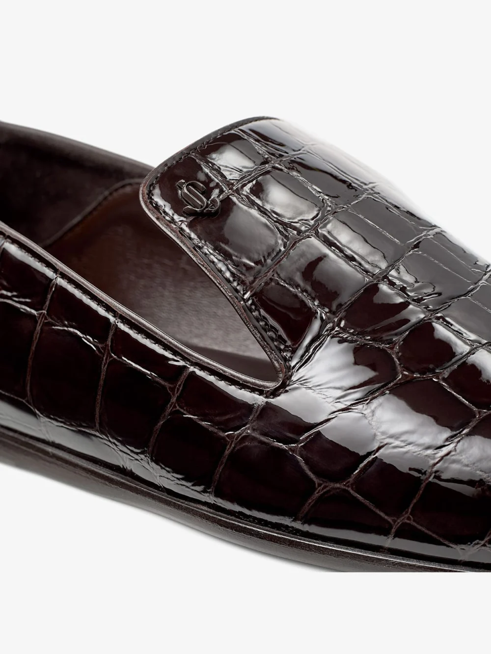 Close-up detail of the Jimmy Choo Eliot Slipper Sambuco Croc Embossed Leather Slippers