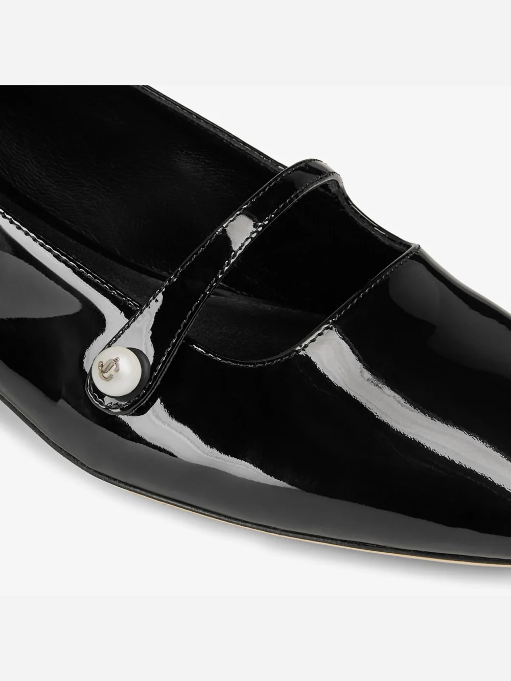 Back view of the Jimmy Choo Elisa Ballerina Black Patent Leather Ballerina Pumps