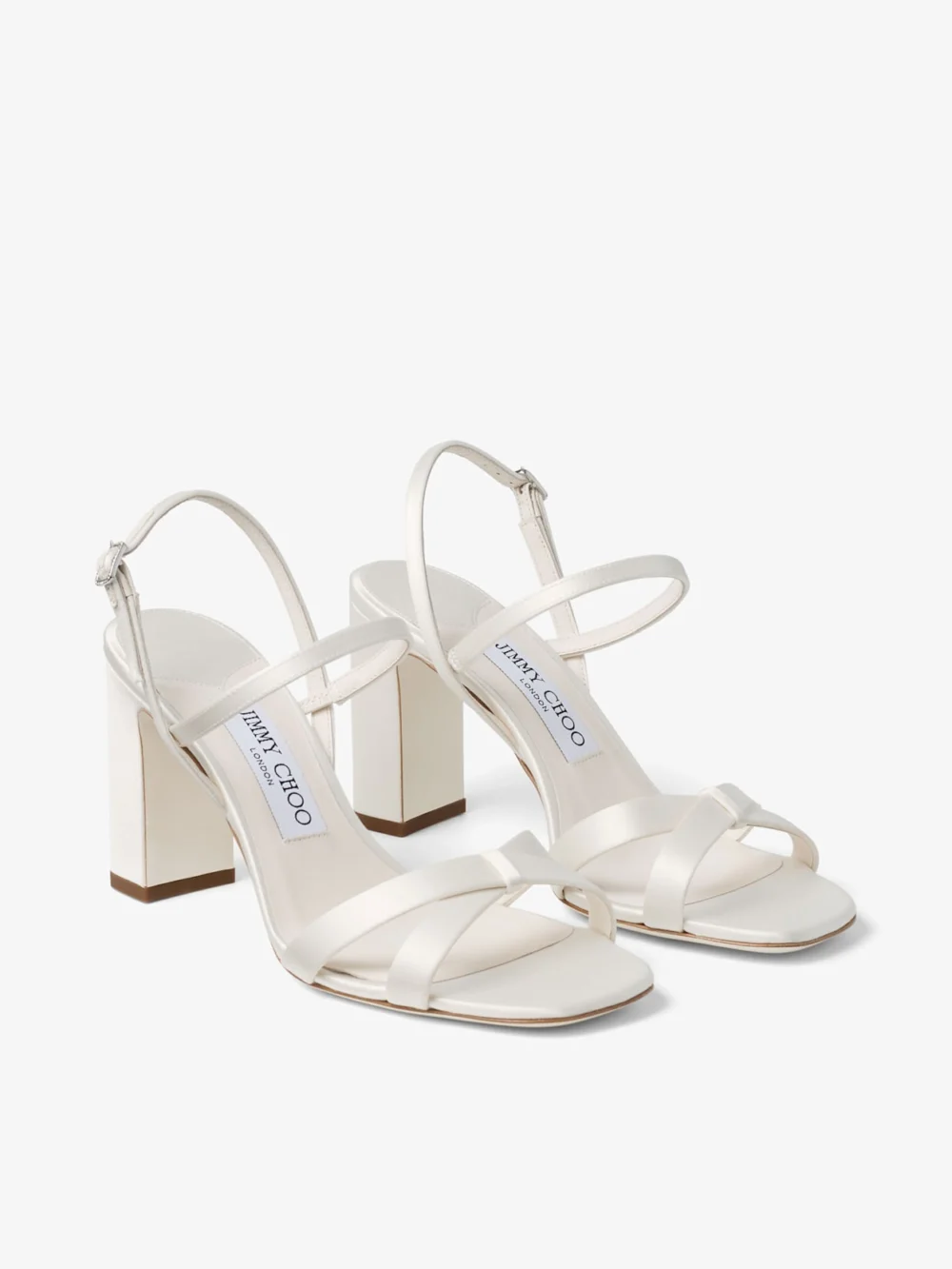 Close-up detail of the Jimmy Choo Elsy Block Heel 85 Ivory Satin Sandals with Crystal Embellished Buckle