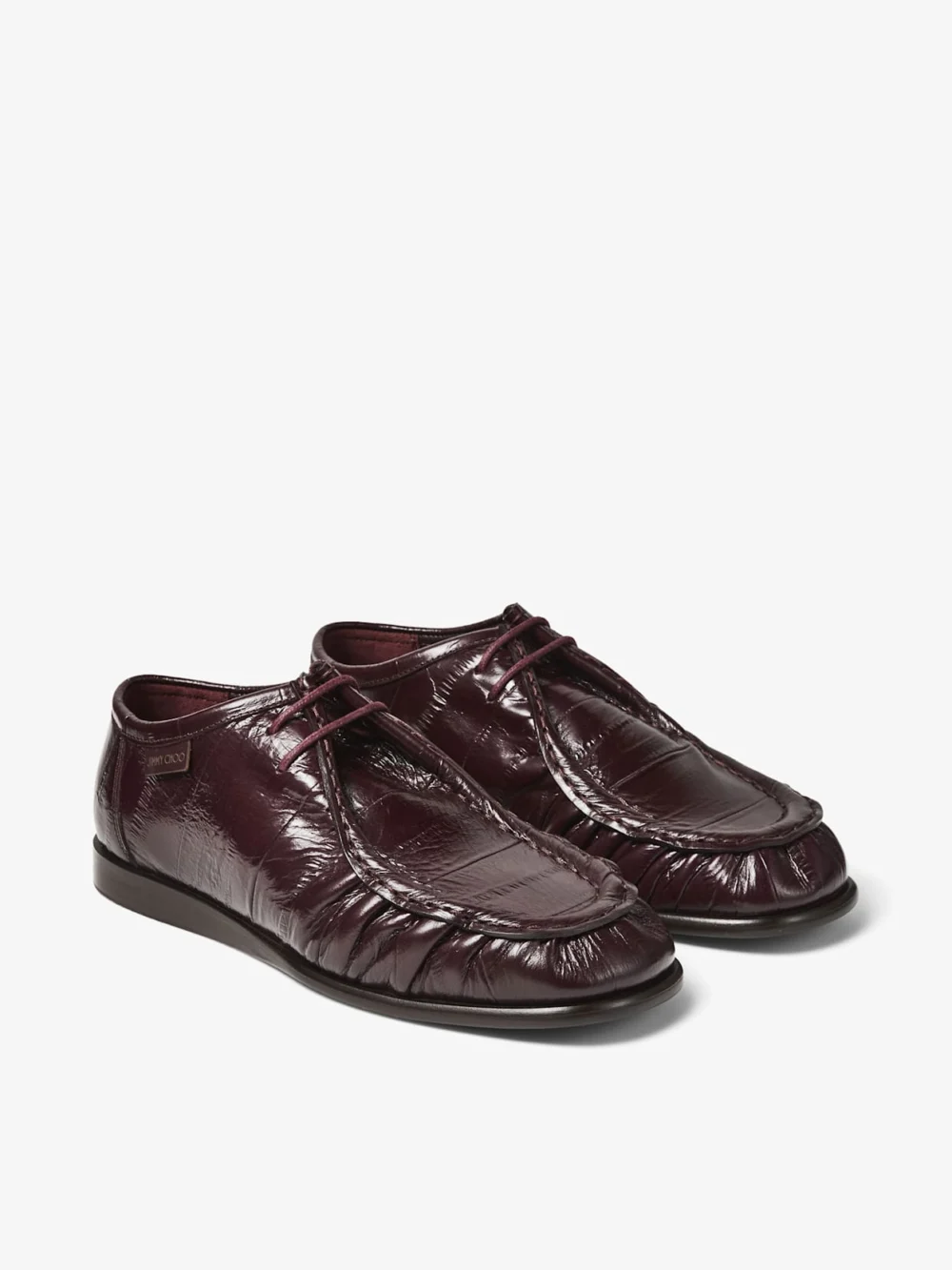 Side view of the Jimmy Choo Ember Moccasin F Deep Merlot Eel Embossed Leather Moccasins
