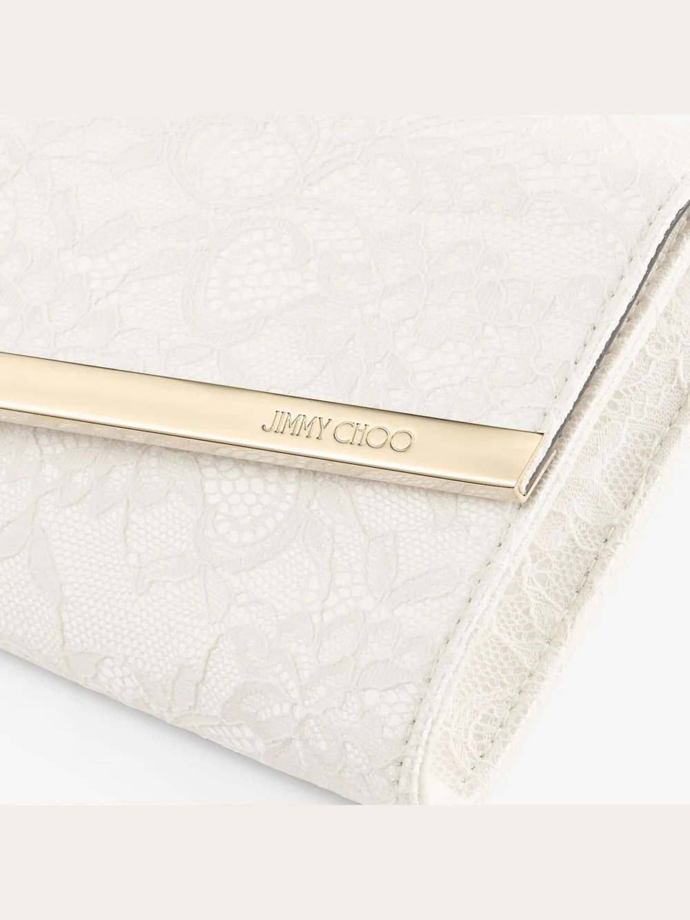 Close-up detail of the Jimmy Choo Emmie Ivory Jimmy Choo Lace Clutch Bag