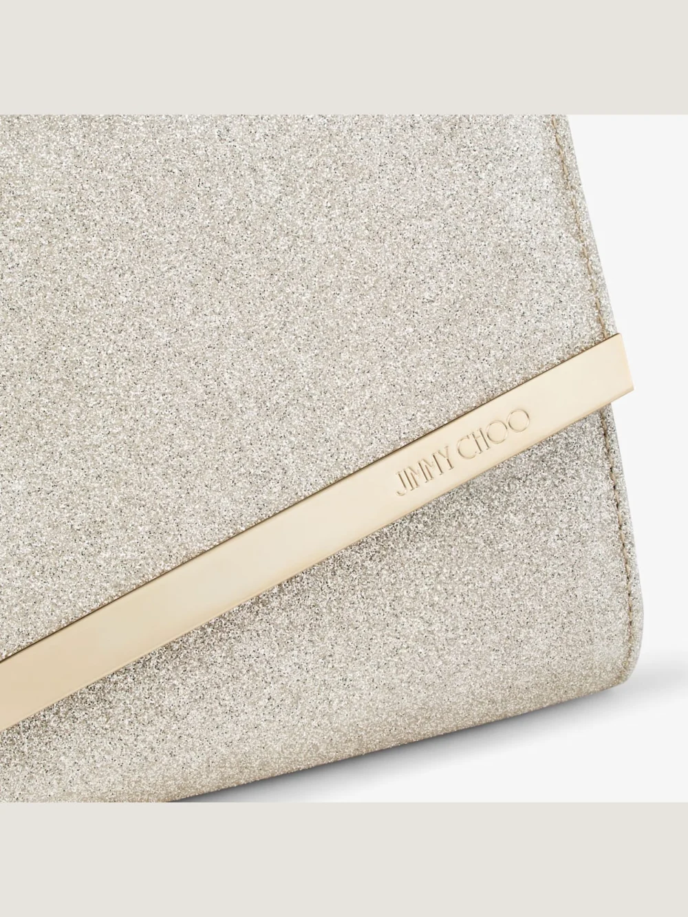 Close-up detail of the Jimmy Choo Emmie Platinum Ice Dusty Glitter Clutch Bag