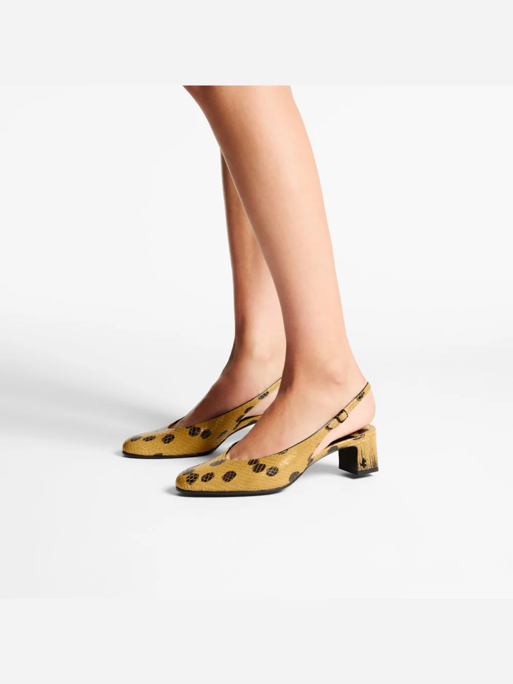 Side view of the Jimmy Choo Eyla Sling Back 45 Cigar and Black Spotty Elaphe Printed Leather Slingbacks