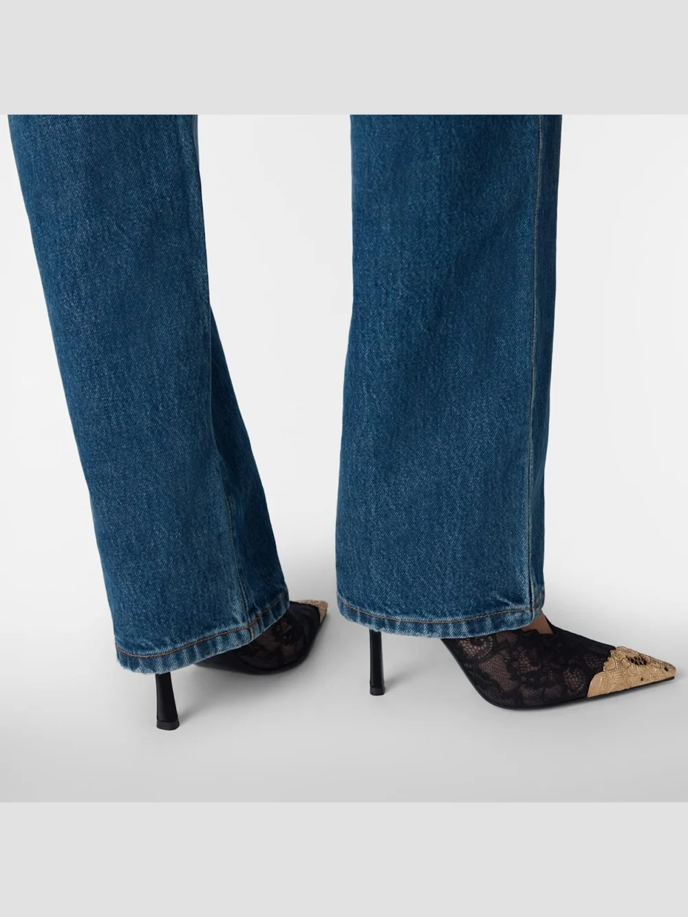 Back view of the Jimmy Choo Faiz 100 Black Jimmy Choo Lace Pumps with Metal Lace Detail