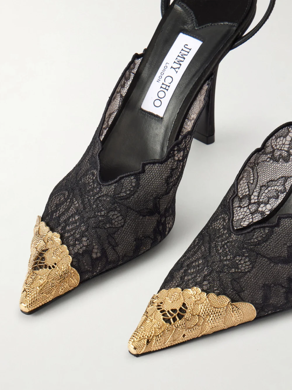 Close-up detail of the Jimmy Choo Faiz 100 Embellished Satin-trimmed Lace Pumps