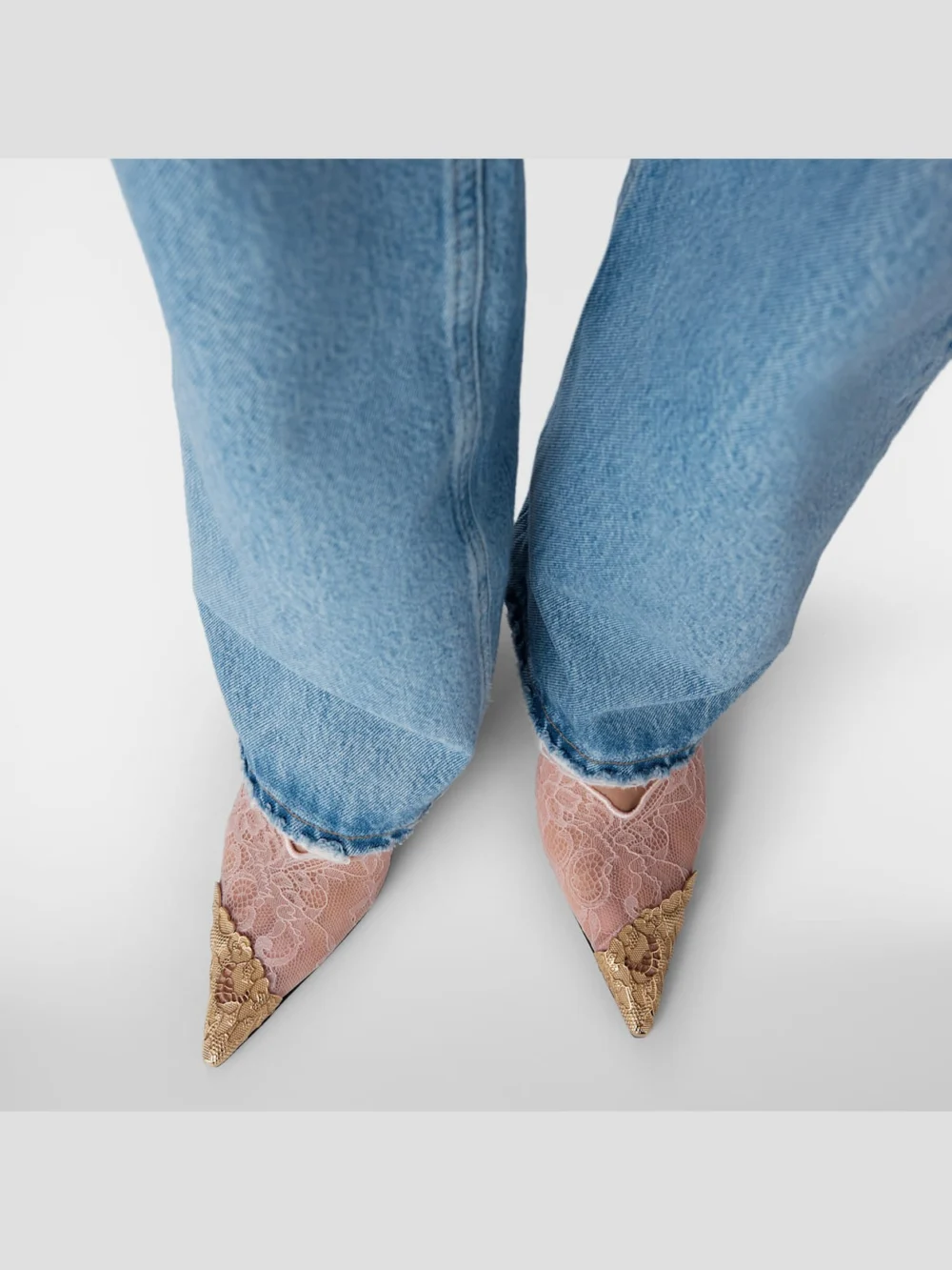 Close-up detail of the Jimmy Choo Faiz 100 Rose Jimmy Choo Lace Pumps with Metal Lace Detail
