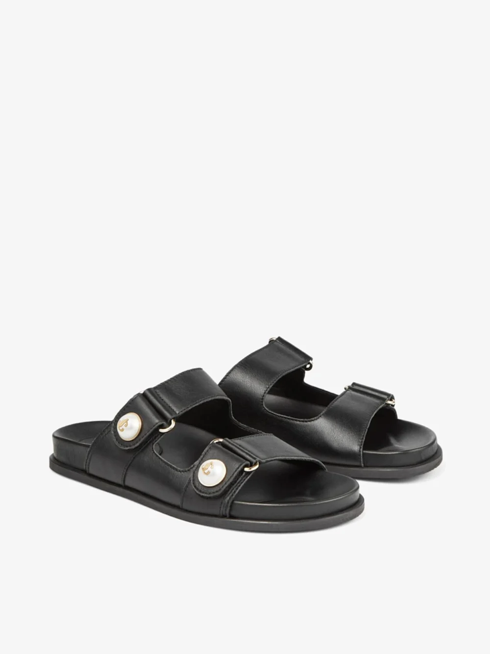 Side view of the Jimmy Choo Fayence Sandal Black Leather Flat Sandals with Pearl Embellishment