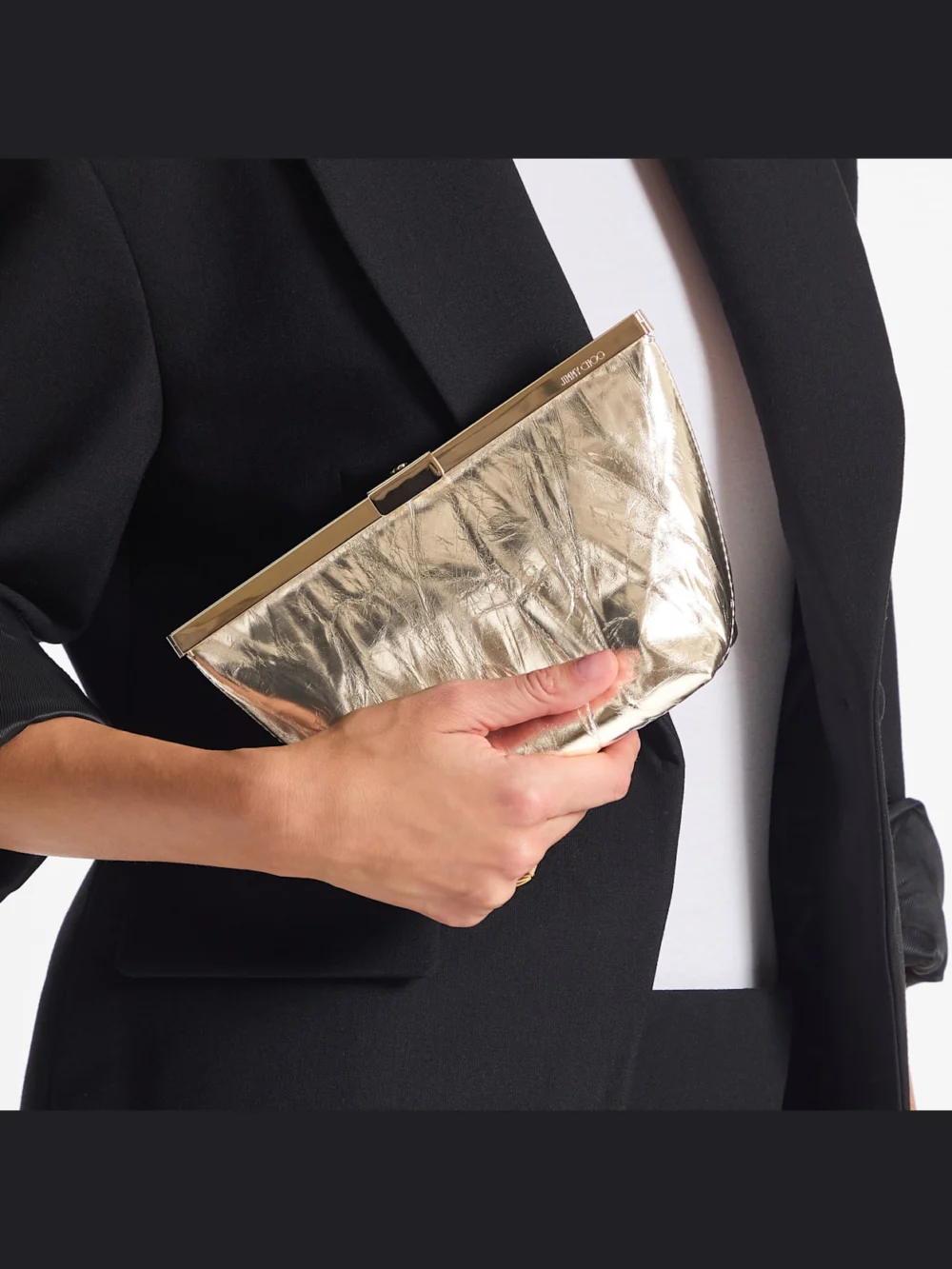 Side view of the Jimmy Choo Ganache Light Platinum Vintage Metallic Leather Clutch Bag