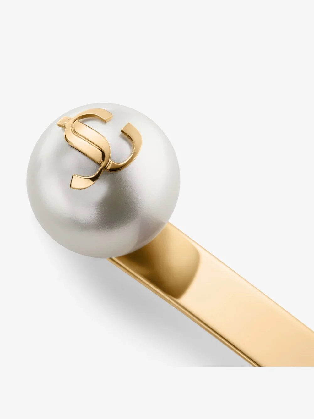 Close-up detail of the Jimmy Choo Hair Slide Gold Finish Pearl Hair Slide