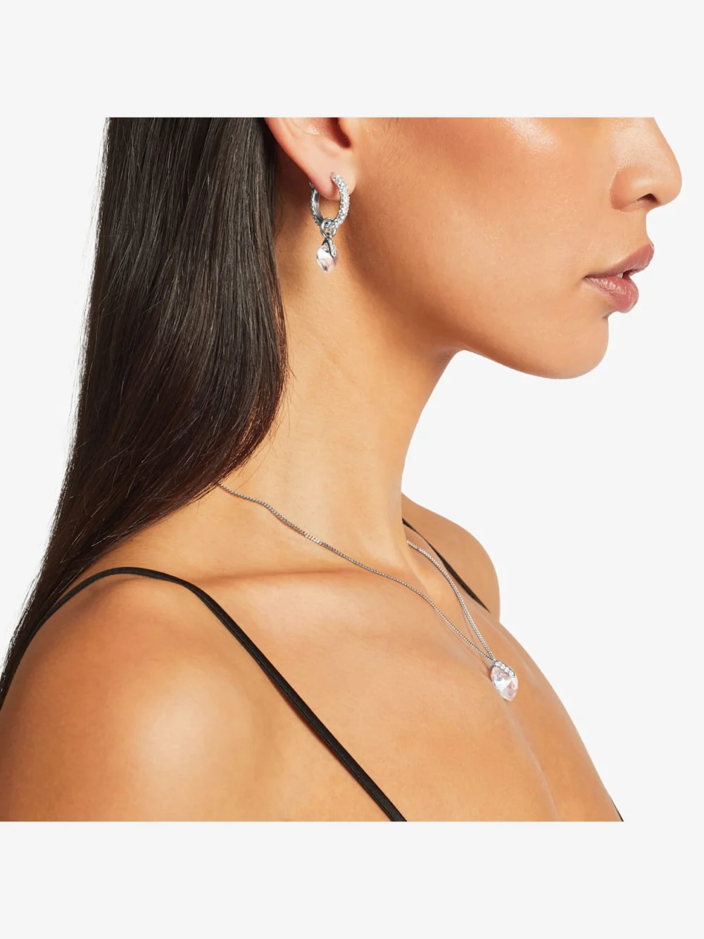 Side view of the Jimmy Choo Heart Hoops Silver Finish Heart Hoop Earrings with Crystals