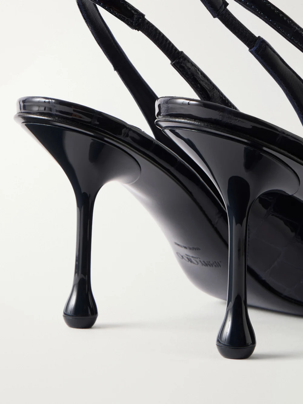Close-up detail of the Jimmy Choo Isa 80 Croc-effect Leather Slingback Pumps
