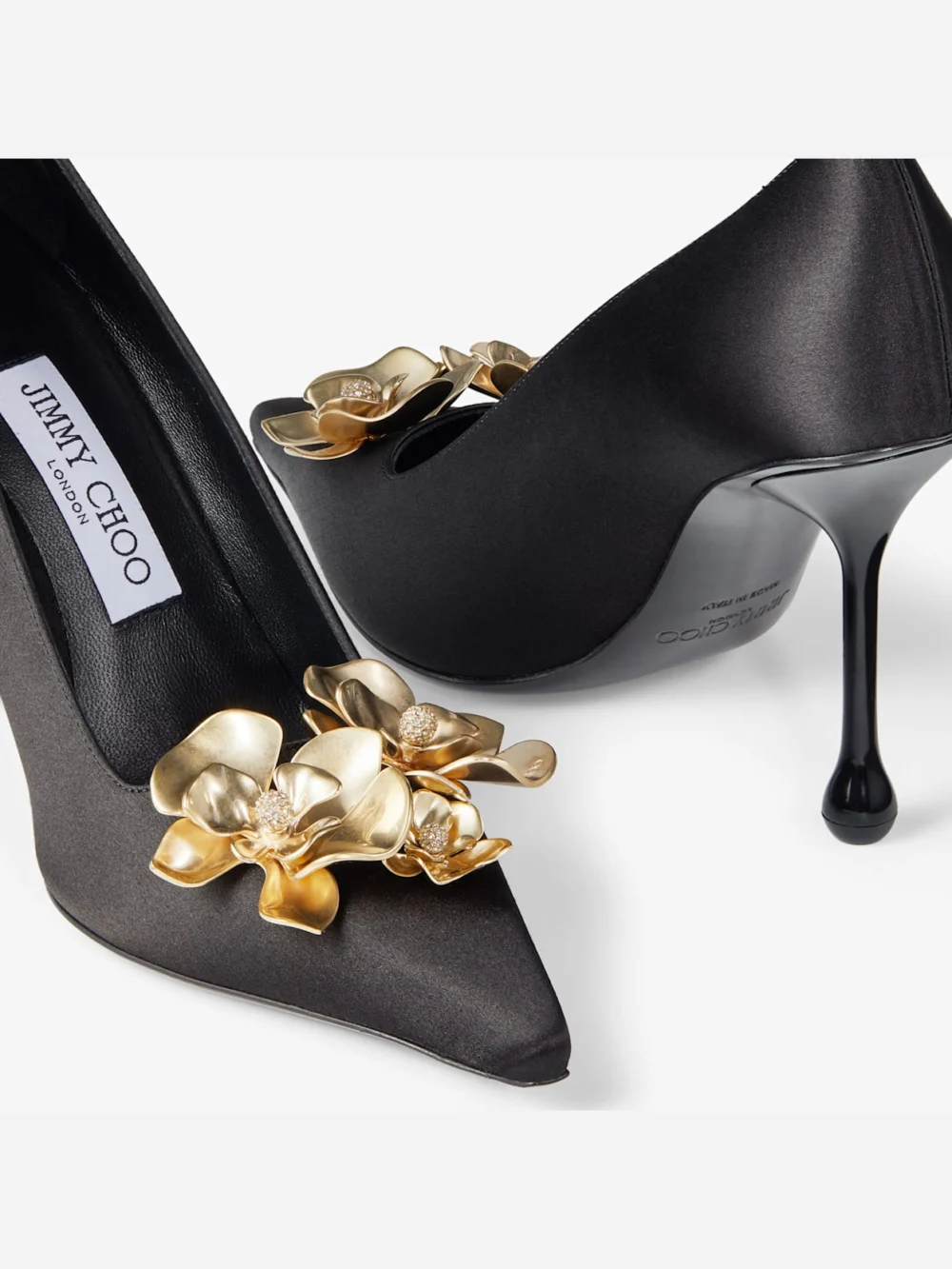 Back view of the Jimmy Choo Ixia 95 Black Satin Pumps with Flowers