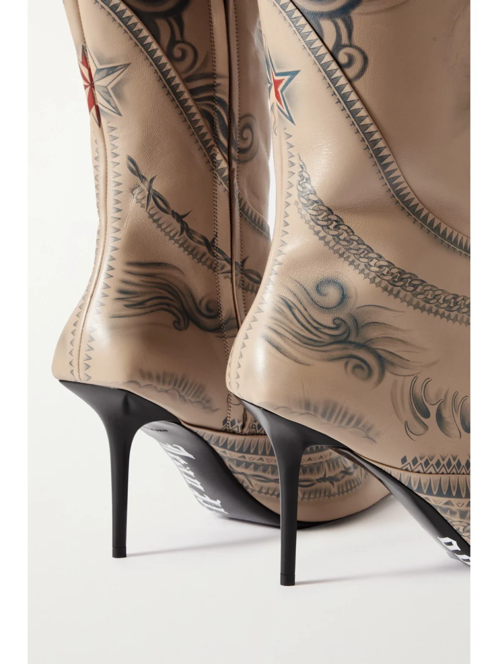 Close-up detail of the Jimmy Choo + Jean Paul Gaultier 90 Printed Leather Knee Boots