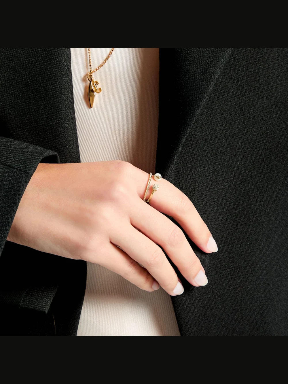 Side view of the Jimmy Choo Jimmy Choo Double Ring Gold Finish Crystal & Pearl Ring