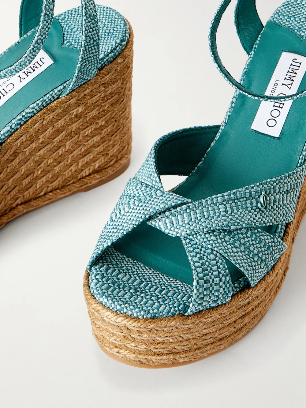 Close-up detail of the Jimmy Choo Korra 100 Raffia Platform Wedge Sandals