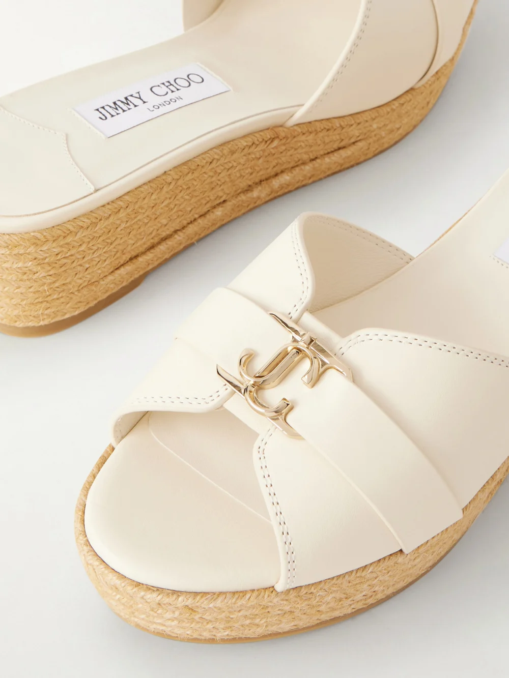 Close-up detail of the Jimmy Choo Leda Logo-embellished Leather Platform Espadrilles