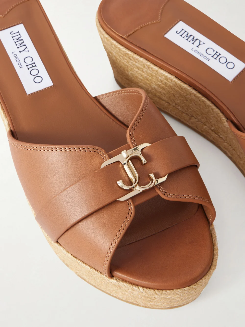 Close-up detail of the Jimmy Choo Leda Logo-embellished Leather Platform Espadrilles