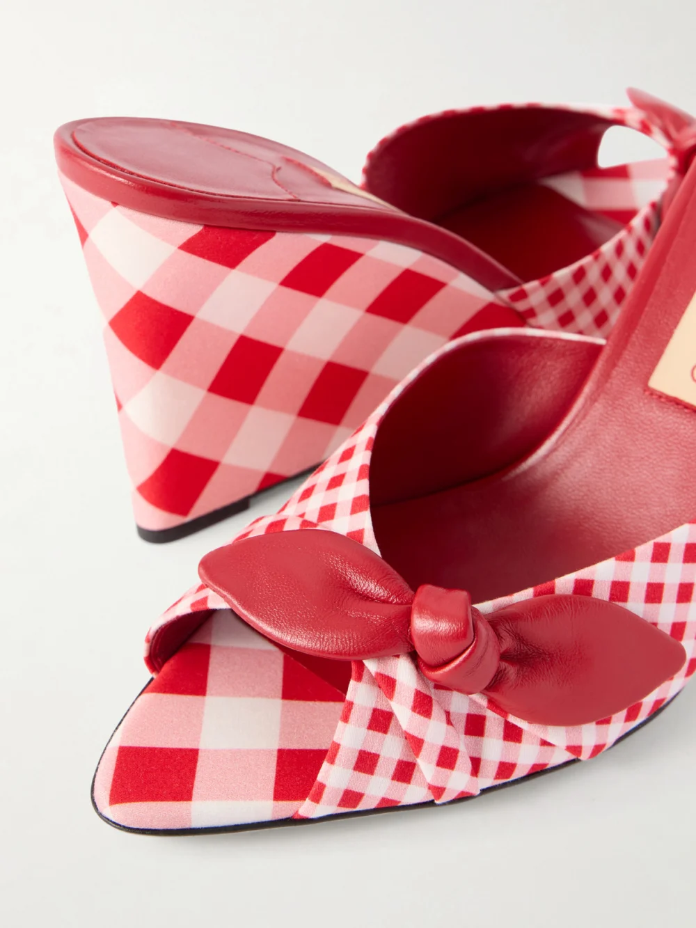 Close-up detail of the Jimmy Choo Livi 85 Leather-trimmed Checked Wedge Mules