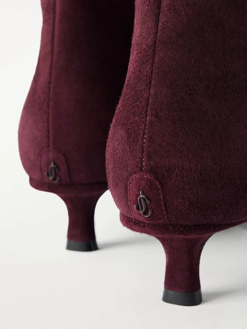 Close-up detail of the Jimmy Choo Lory 35 Suede Ankle Boots