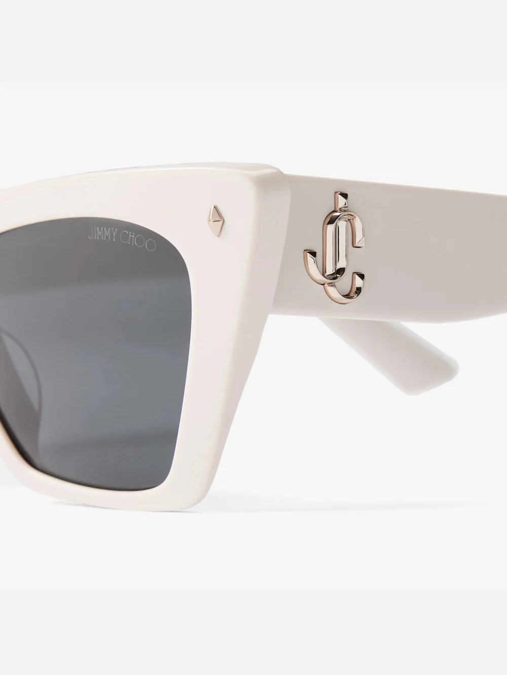 Close-up detail of the Jimmy Choo Lou Milk and Grey Acetate Cat Eye Sunglasses