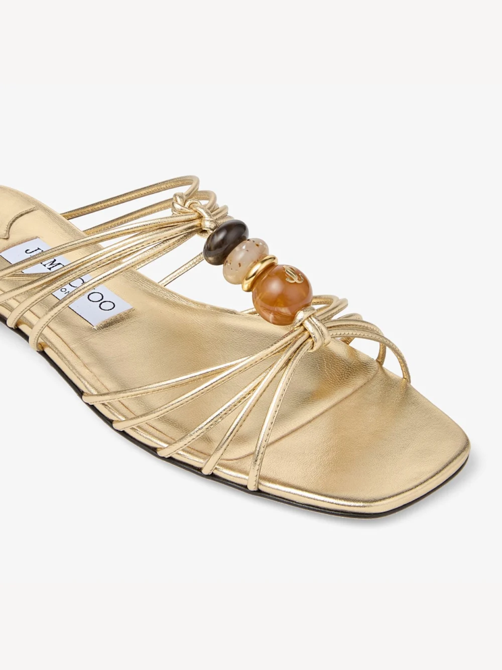 Back view of the Jimmy Choo Lova Mule Flat Gold Mix Metallic Nappa Leather Flats with Beads