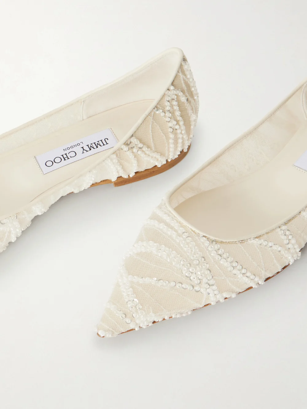 Close-up detail of the Jimmy Choo Love Embellished Mesh Point-toe Ballet Flats
