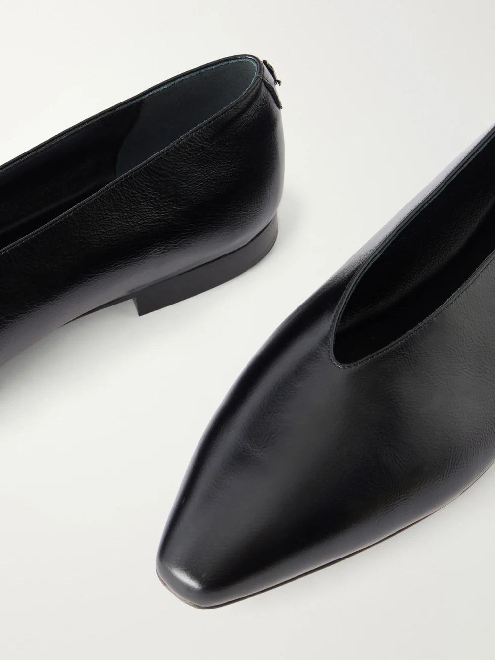 Close-up detail of the Jimmy Choo Margot Leather Ballet Flats