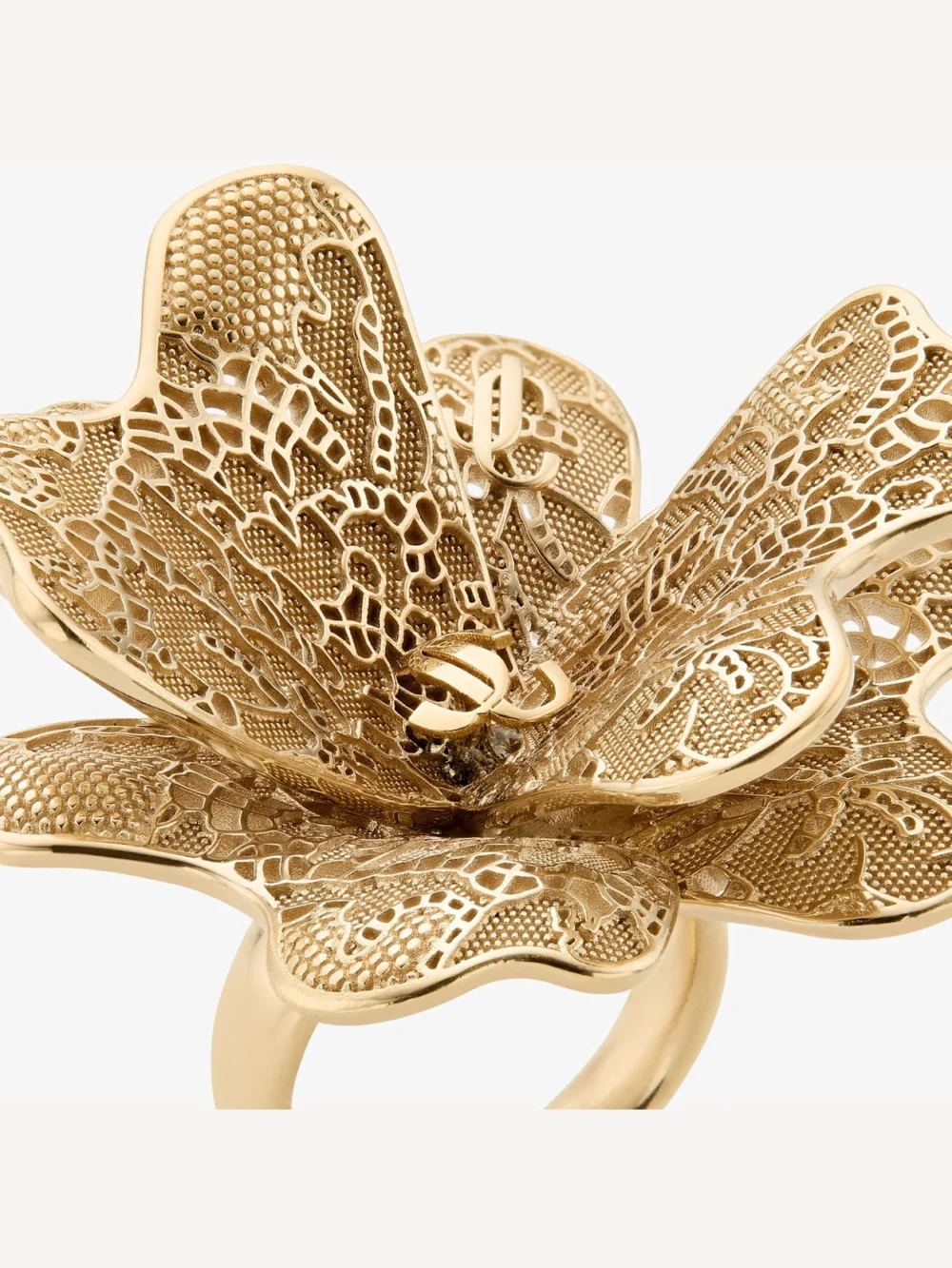 Close-up detail of the Jimmy Choo Maxi Corsage Ring Gold Finish Metal Corsage Ring