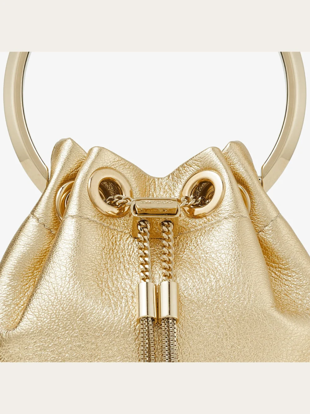 Close-up detail of the Jimmy Choo Micro Bon Bon Gold Metallic Nappa Mini Bag