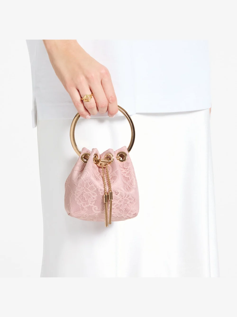 Side view of the Jimmy Choo Micro Bon Bon Rose Satin and Jimmy Choo Lace Mini Bucket Bag